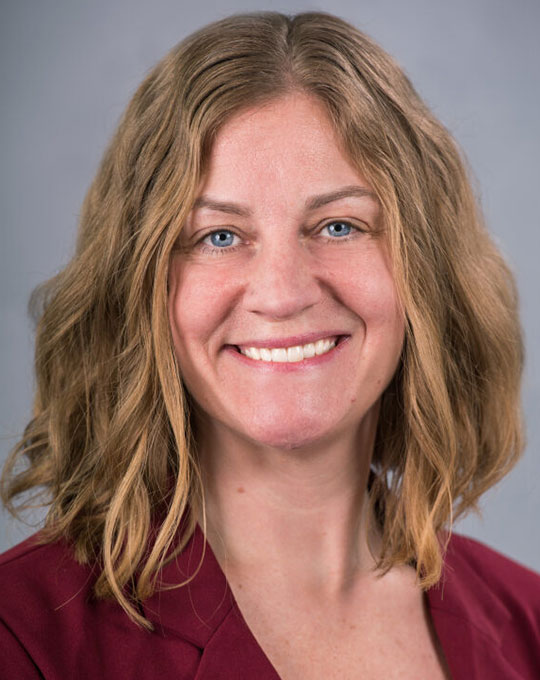 headshot of woman smiling