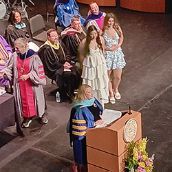 several people standing on a stage
