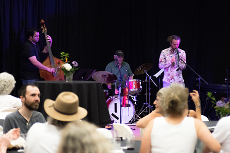musicians performing in front of a crowd