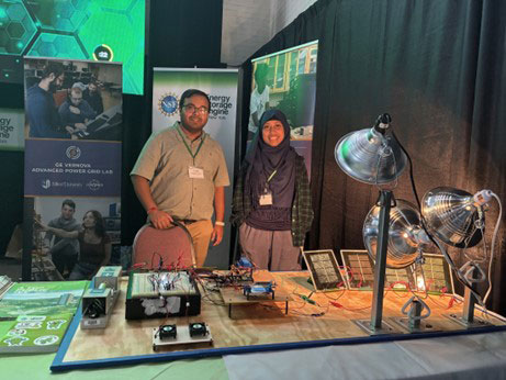 a man and a woman standing behind a table