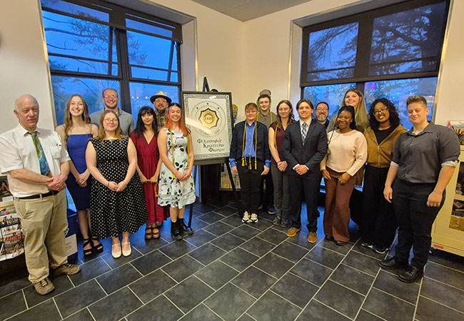 group of people standing in a row