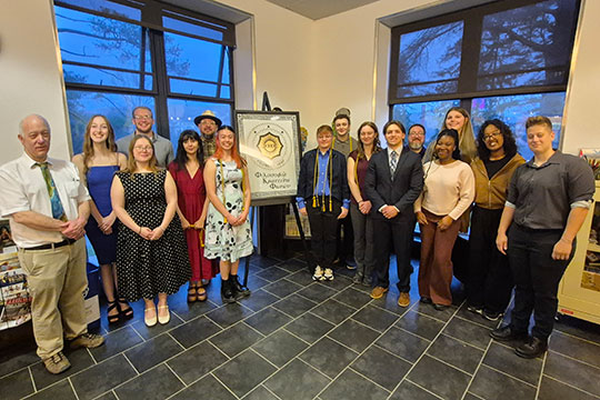 group of people standing in a row