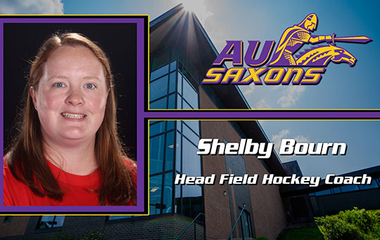 headshot of a woman with long brown hair