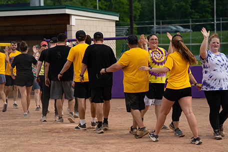 Summer softball high fives