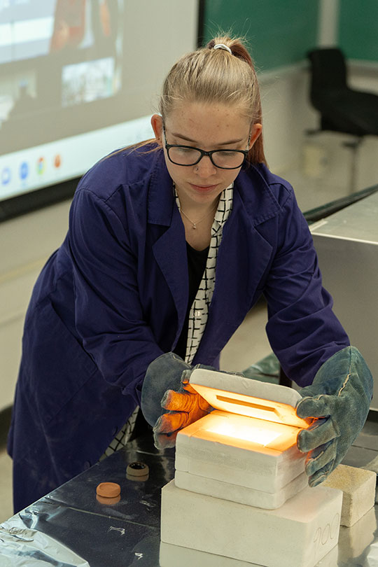 young woman with glasses