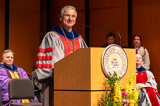 man standing at a podium