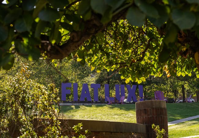 fiat lux sign on campus