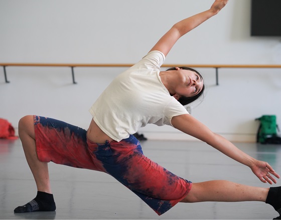 student performing in a dance class