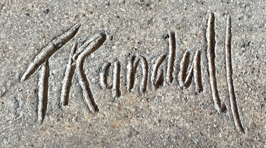 Ted Randall's signature/mark on the bottom of a ceramic piece of art