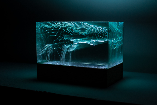 Sculpture. Laser etched glass block, LCD backlight, wooden base