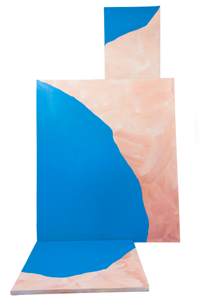acrylic painting, one canvas flat on floor, one large upright, and smaller canvas on top of larger one. Solid blue, and soft pink mixed gradient.