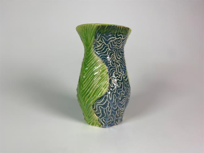 Hand carved ceramic vase with sgraffito detailing