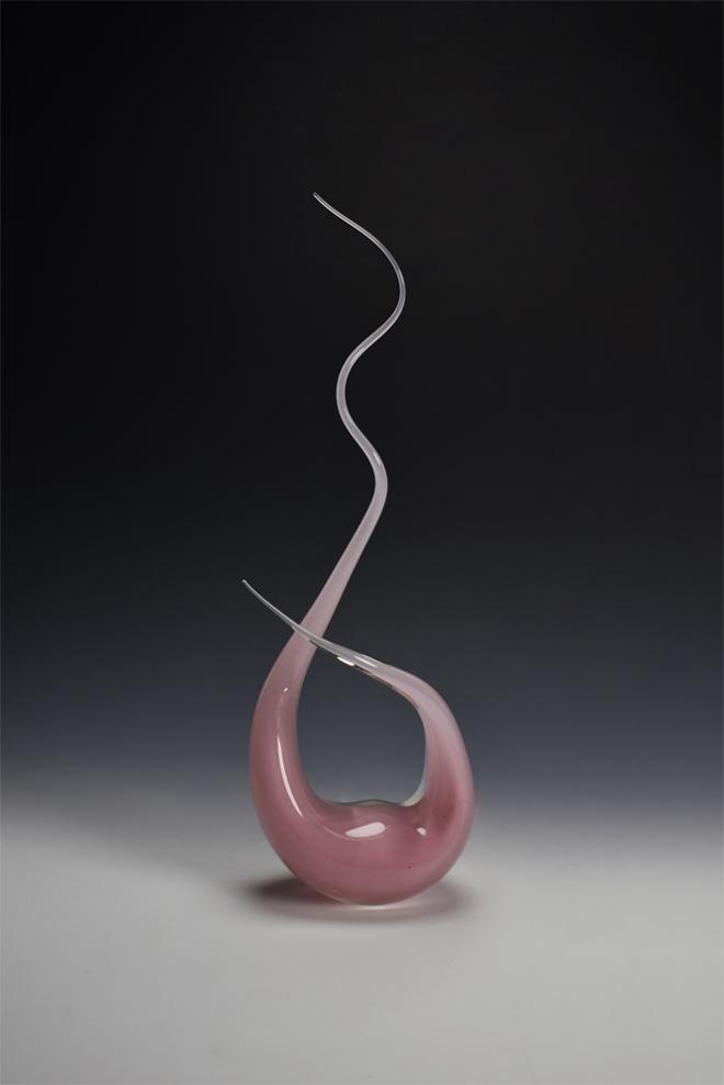 A flowing, light pink sculpture with two tendrils pulled upwards to wisp-like points.
