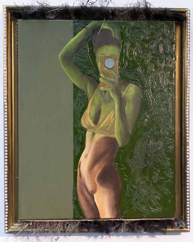 Black woman framed by hair while she is bald and being overcome by green infectious paint.