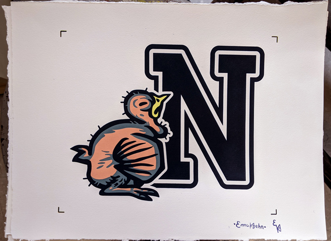Print of a fictional school mascot, a small, pink, featherless baby bird, beside a large, dark blue, letterman-style letter N