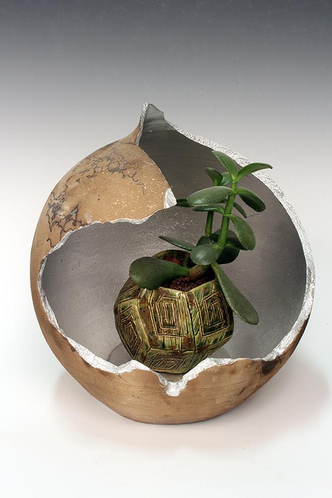 Ceramic reliquary with jade plant