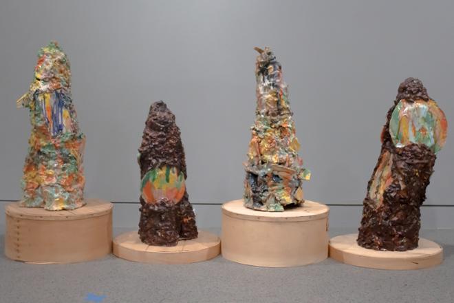 Four tall pointed cones made from recycled ceramics, covered in bright multi colored glazes. Sitting on cheese boxes that alternate between low and tall heights. Each piece plays a sound that uses nostalgic and absent noises.   