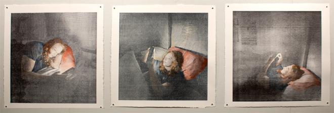 Three prints, all of a woman laying in bed looking at her phone. The prints are on white paper with a deckled edge and hand colored. The woman has pale skin and red hair, and is wearing a blue shirt. She rests on a red pillow.