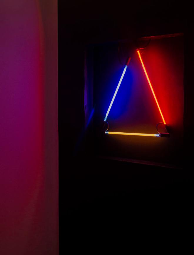 Neon tubes arranged in a triangle. 