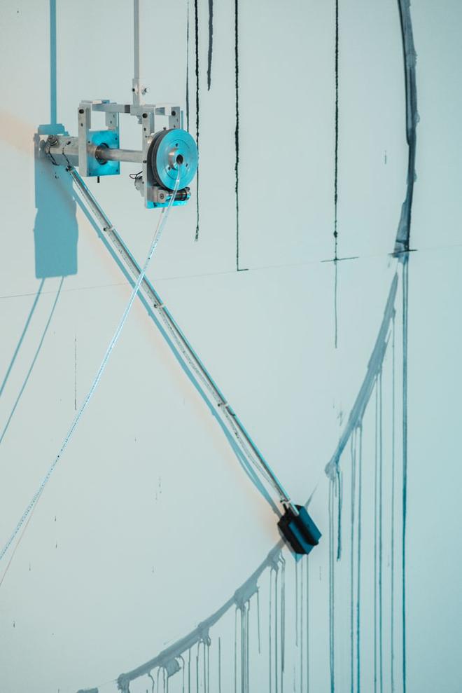 Photograph from a Thesis Exhibition by a 2023 MFA graduate Tomáš Penc featuring a close-up view of his kinetic sculpture titled Night is a Day That Fell Short.