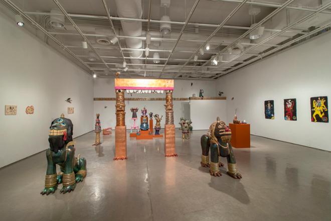 Exhibition installation featuring large, animal and human-esc ceramics sculptures. 