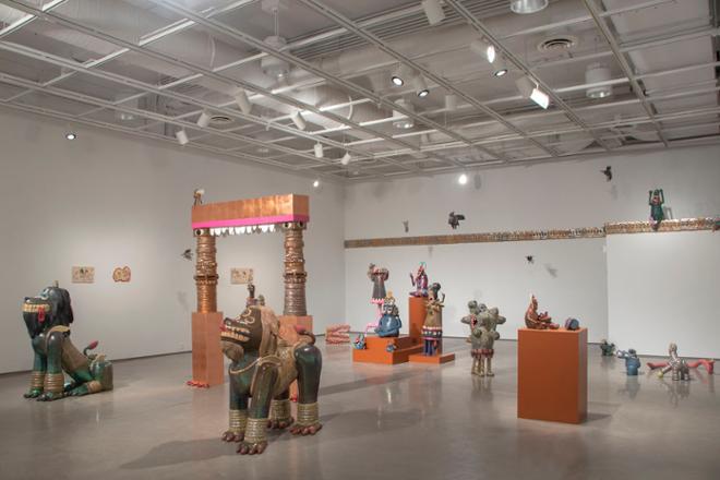 Exhibition installation featuring large, animal and human-esc ceramics sculptures.
