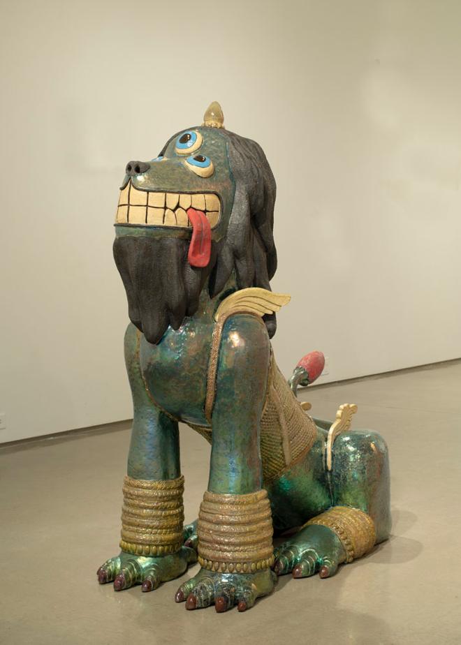 A large, dog-like ceramic sculpture.
