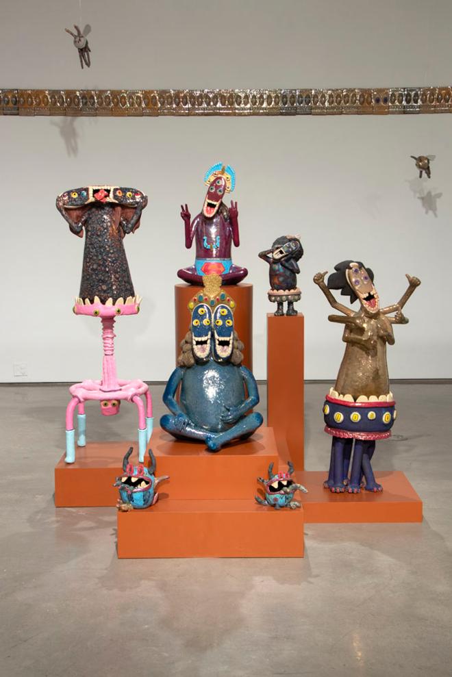 The installation of several human-esc ceramic sculptures