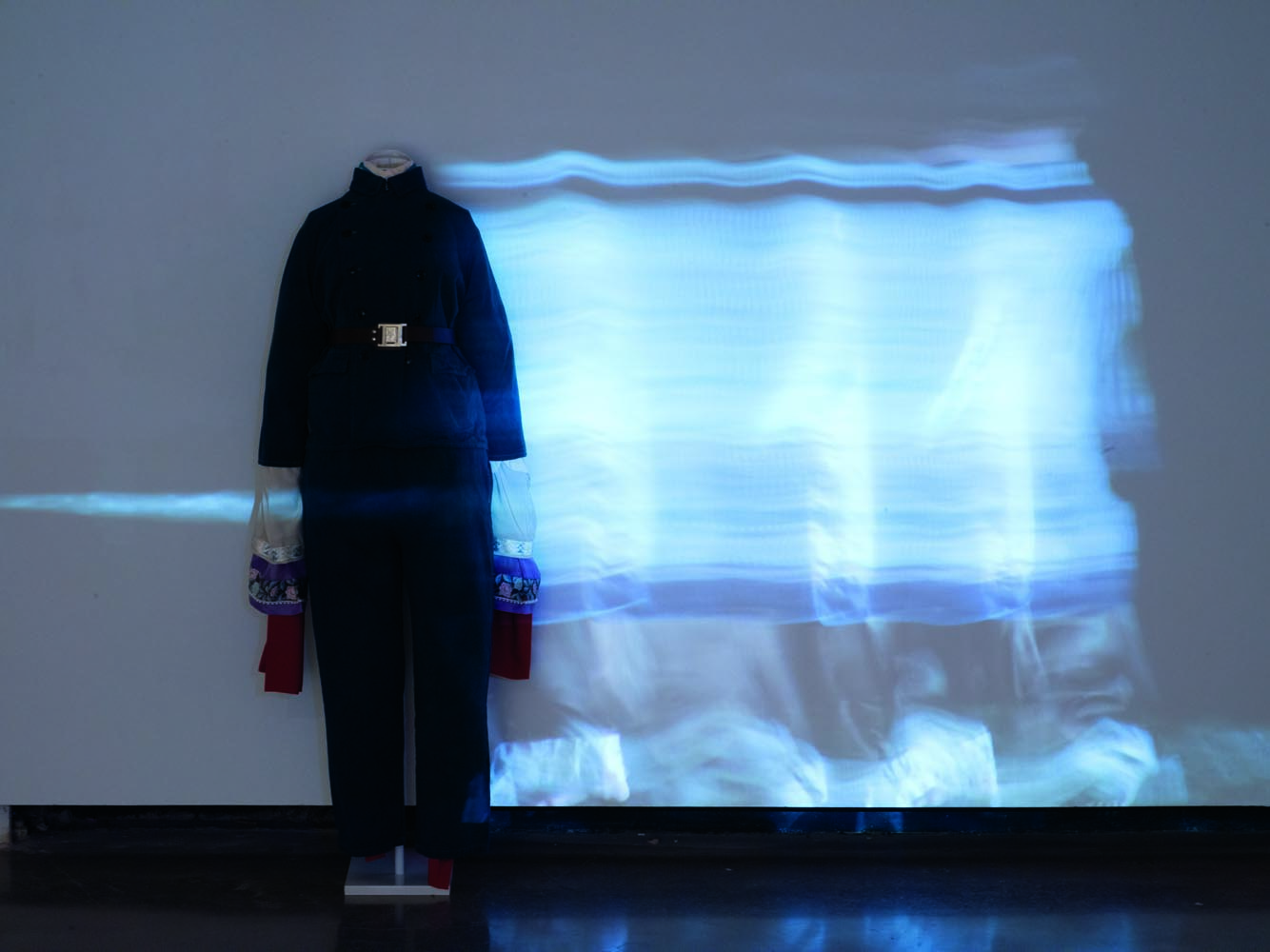 Video projection onto a clothes mannequin. 