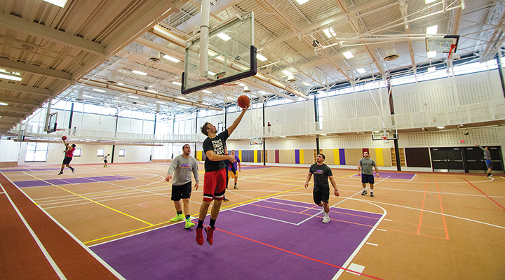a pickup game of basketball on the court