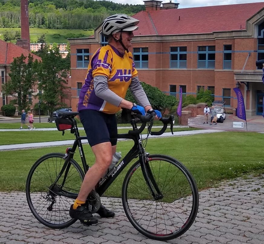 Larry Ploetz bicycling to Reunion.