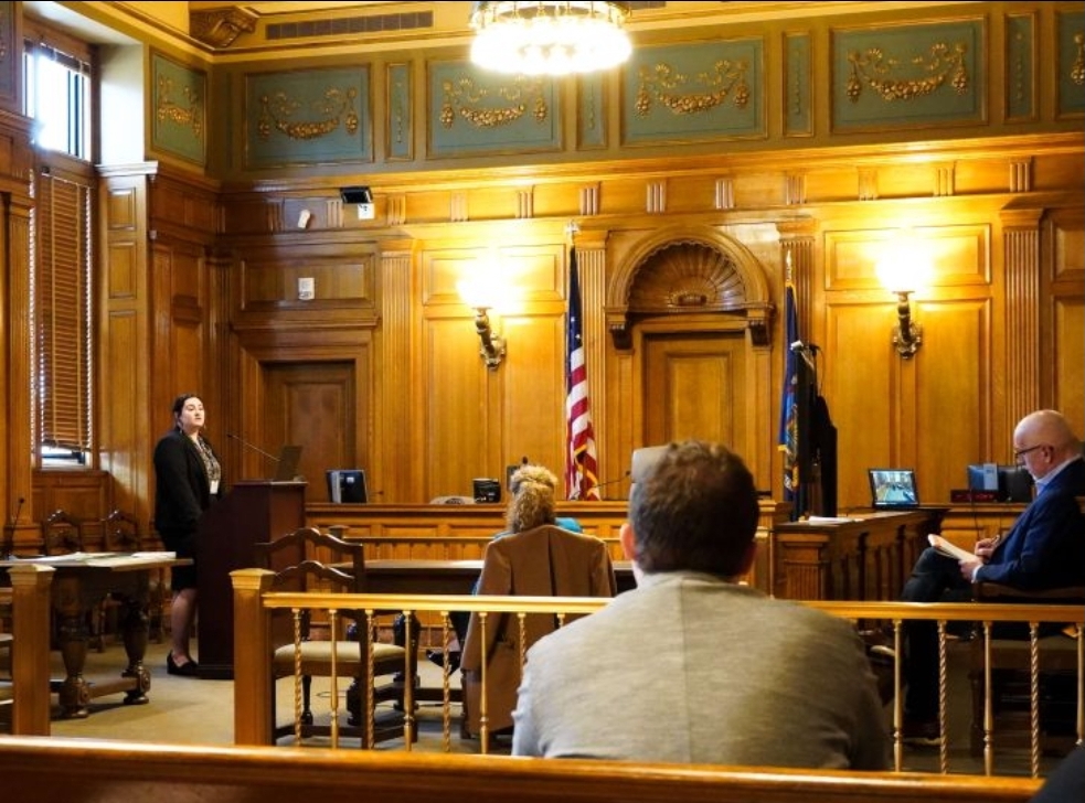 A photo of Braeden Knoll practicing law in a courtroom