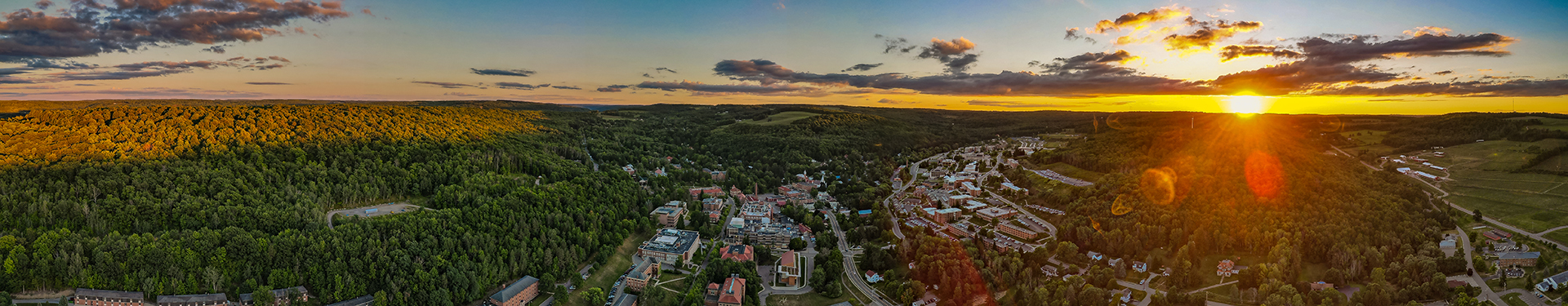 A drone photo of a sunset over Alfred New York