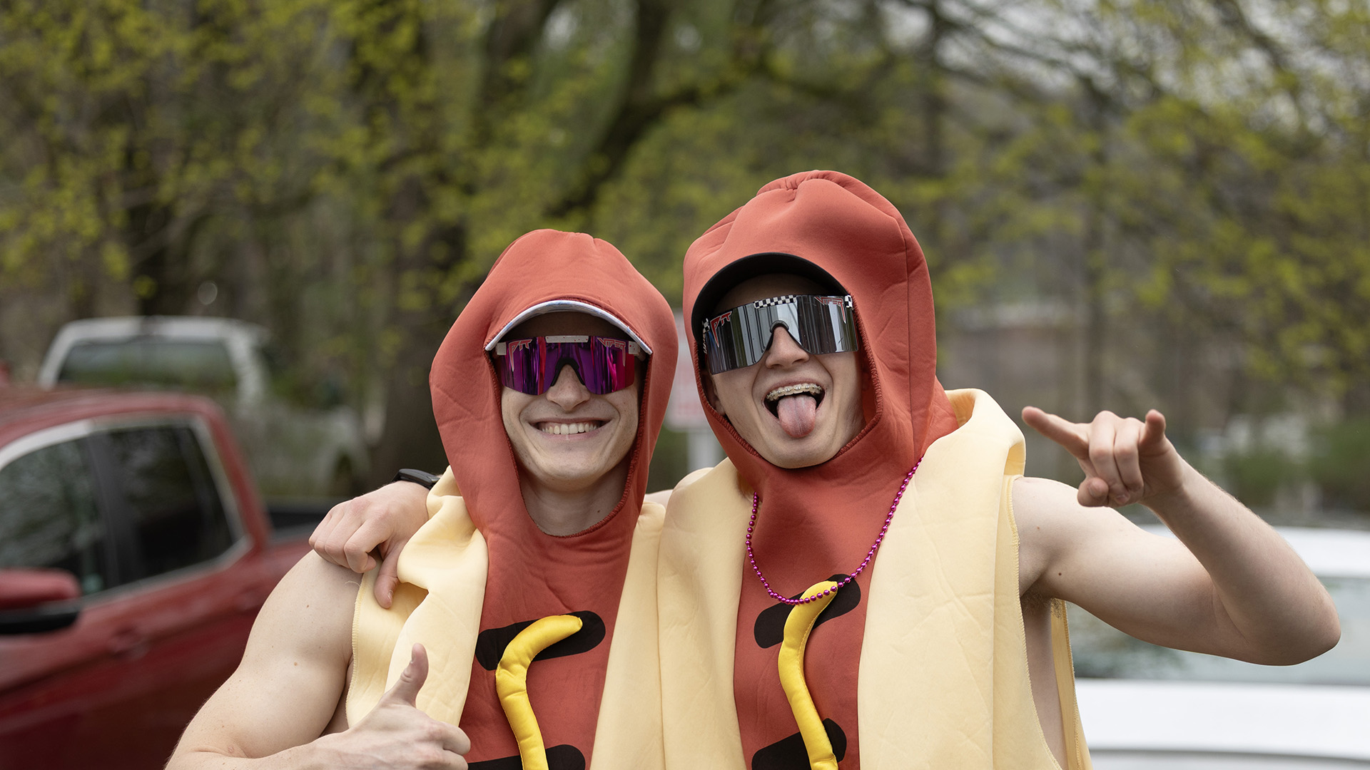 A photo of two Alfred University students in hot dog costumes
