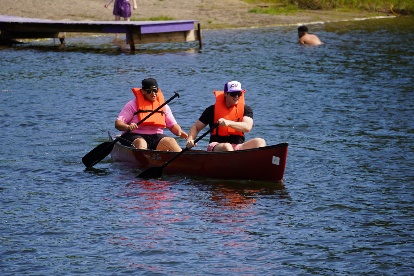 A photo of two students in a kayak