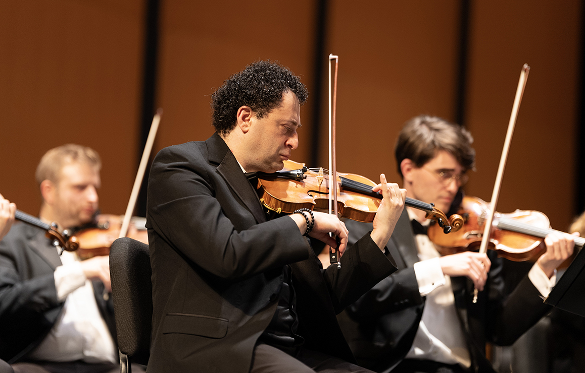 A photo of a violinist in the MostArts Festival Orchestra