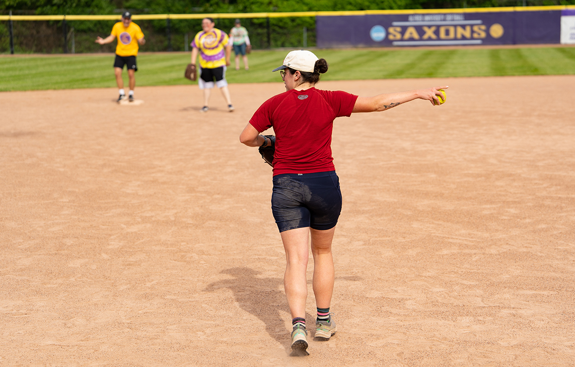 A photo of Alfred University faculty and staff playing softball