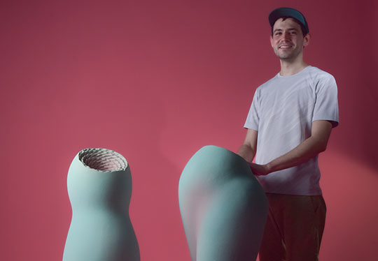 alumnus uriel caspi with sculpture