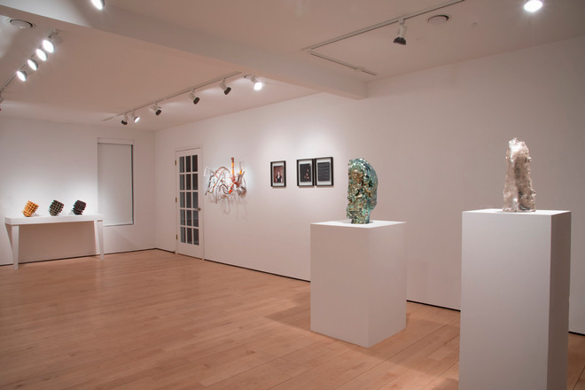 various art displayed in corner of gallery space