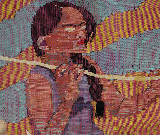 cloth weaving of a woman holding a stick