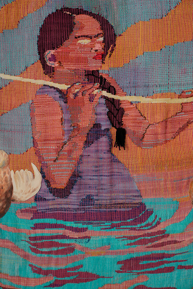 cloth weaving of a girl holding a stick