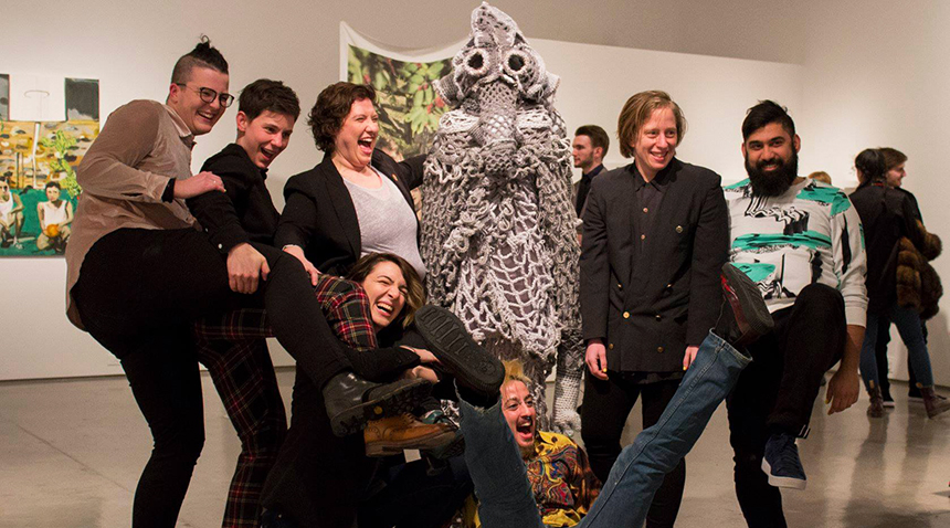 curators of queering space exhibit having fun posing together