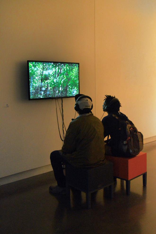 Forest TV Screen with Person listening on headphones