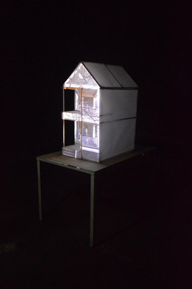 A projecting house on the table