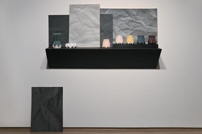 geometric vases on a shelf