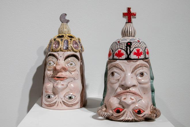 ceramic pieces with faces mirrored on each