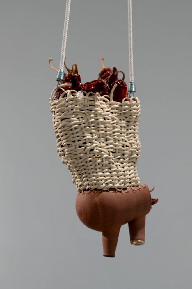 suspended art piece using various materials by Aida Lizalde