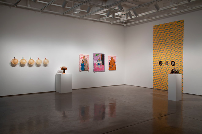 art gallery showcasing diverse paintings and sculptures