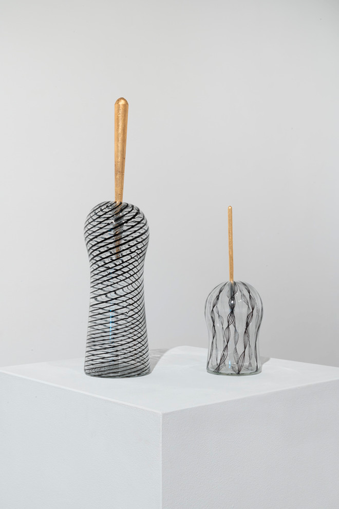 detail look at bell shaped sculptures