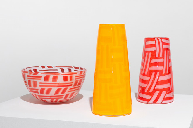 vibrant yellow and orange set of a bowl and two vases